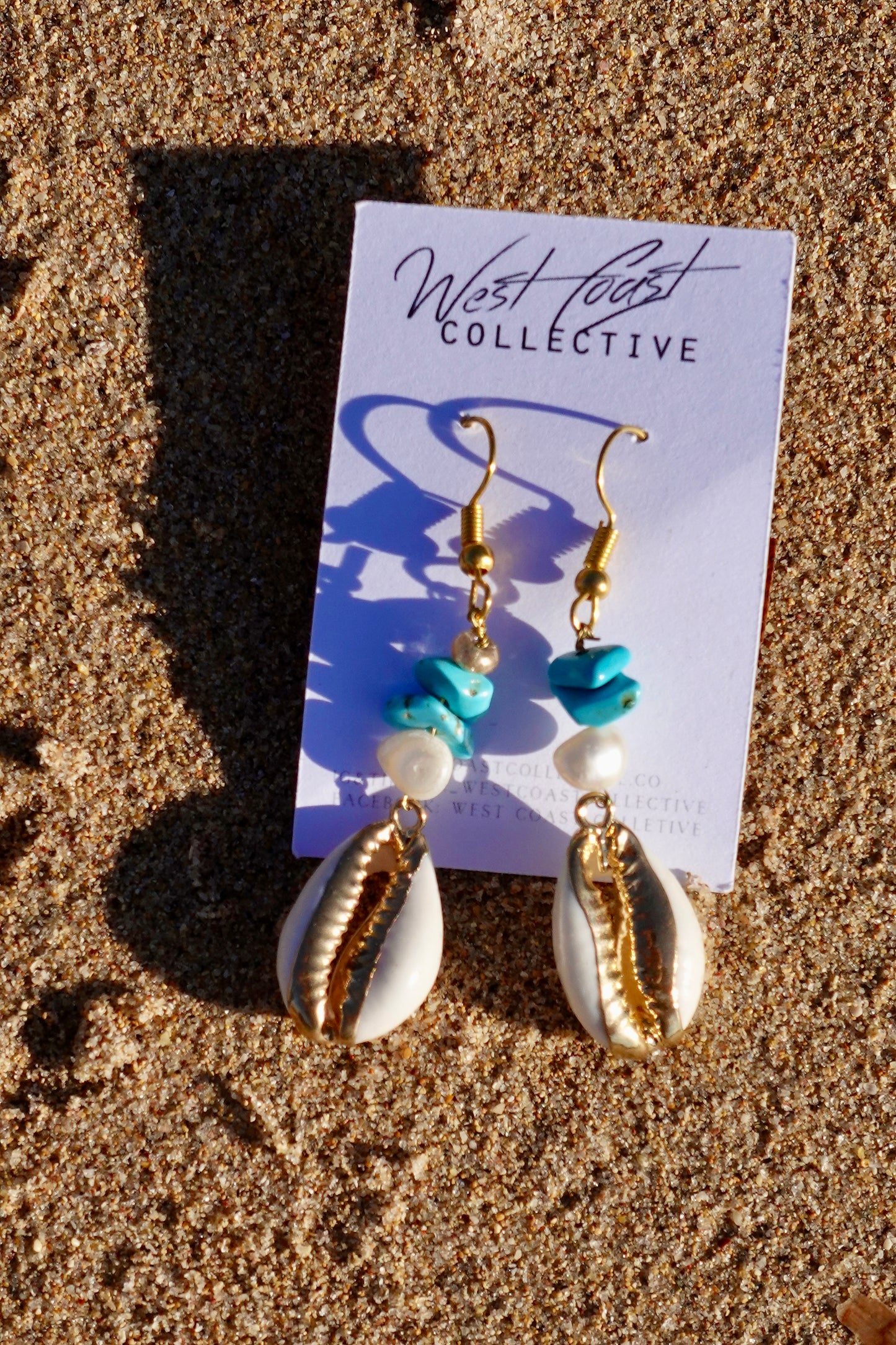 Handmade golden cowrie earrings