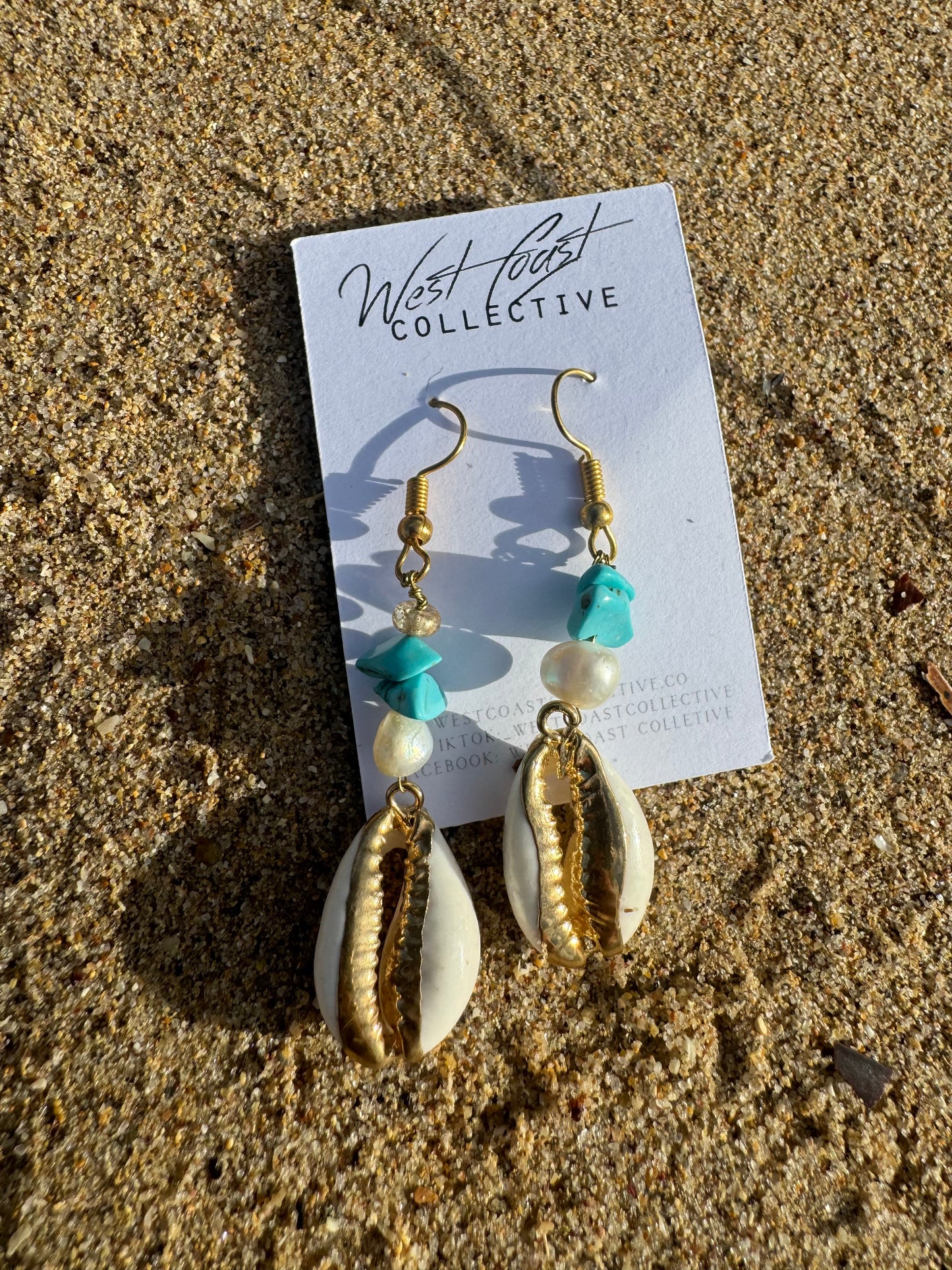 Handmade golden cowrie earrings